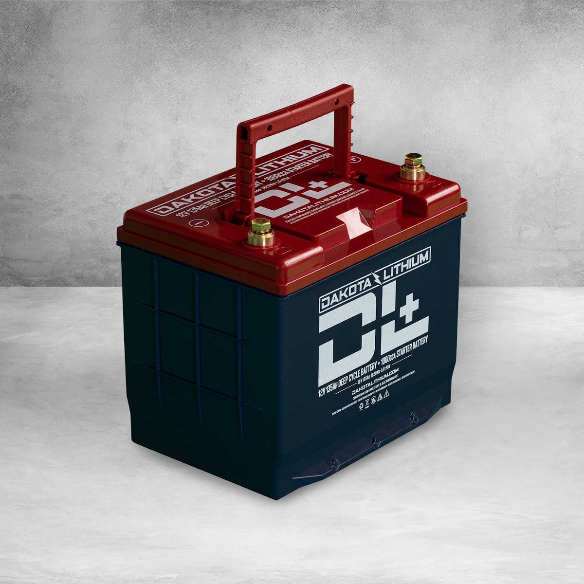 This dual performance LiFePO4 battery has a red lid and handle with navy blue casing that says "DL+" in huge white lettering.
